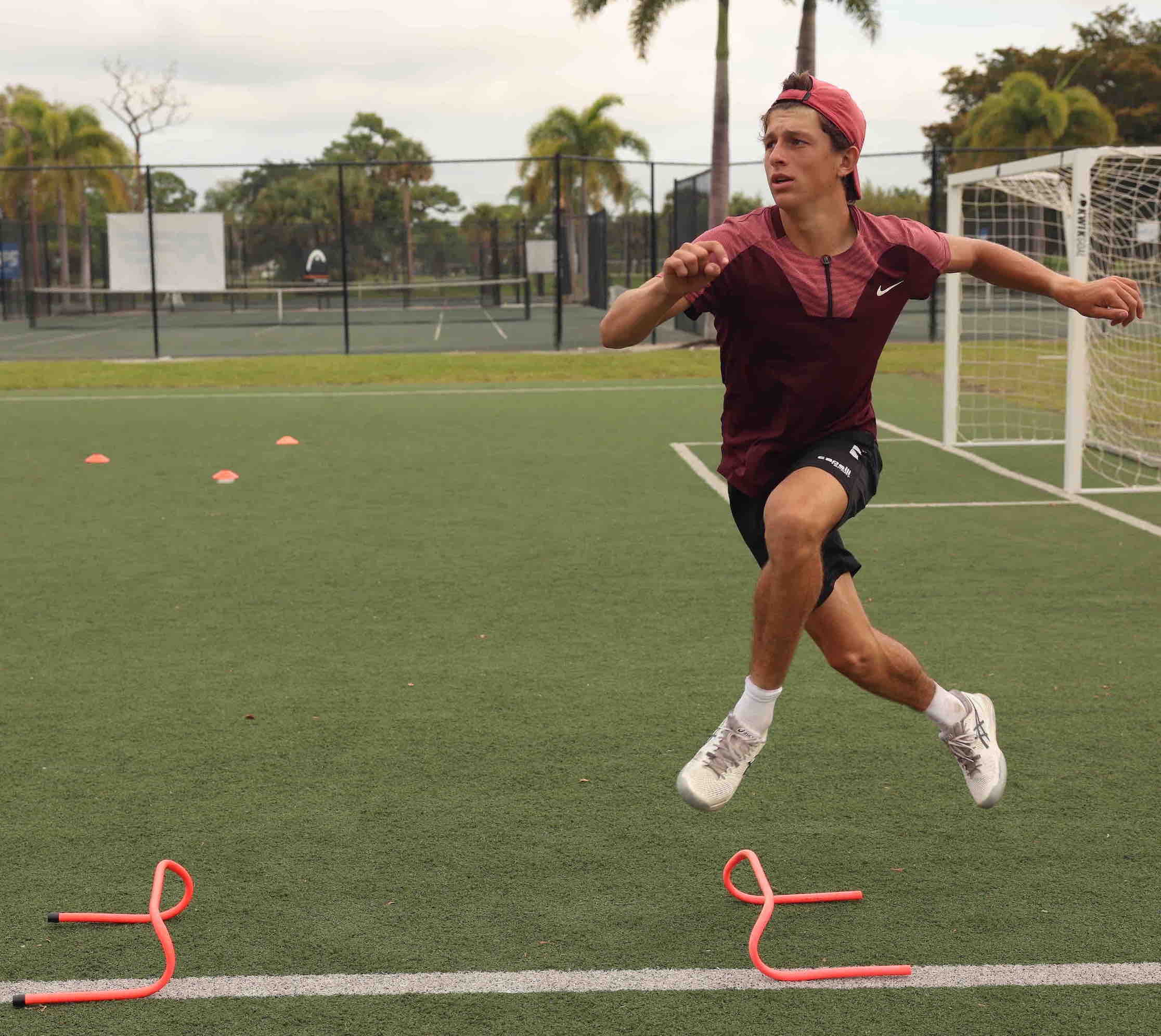 Athletes performing speed and agility drills.