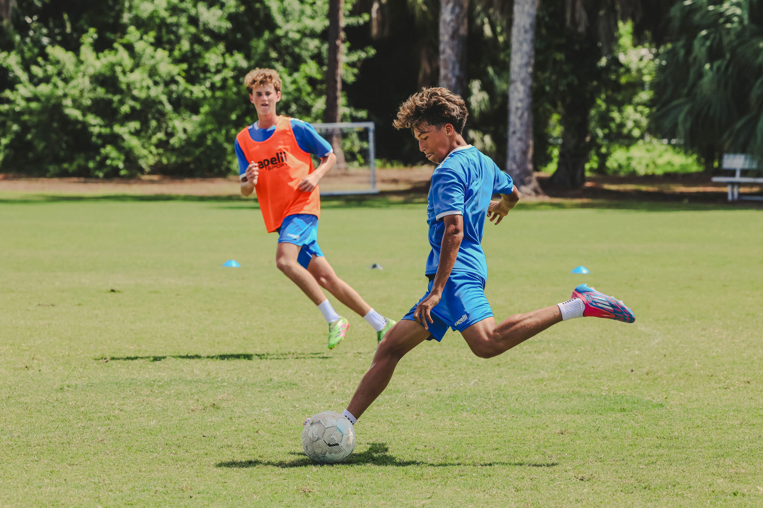 Athletes in synchronized motion during conditioning drills.