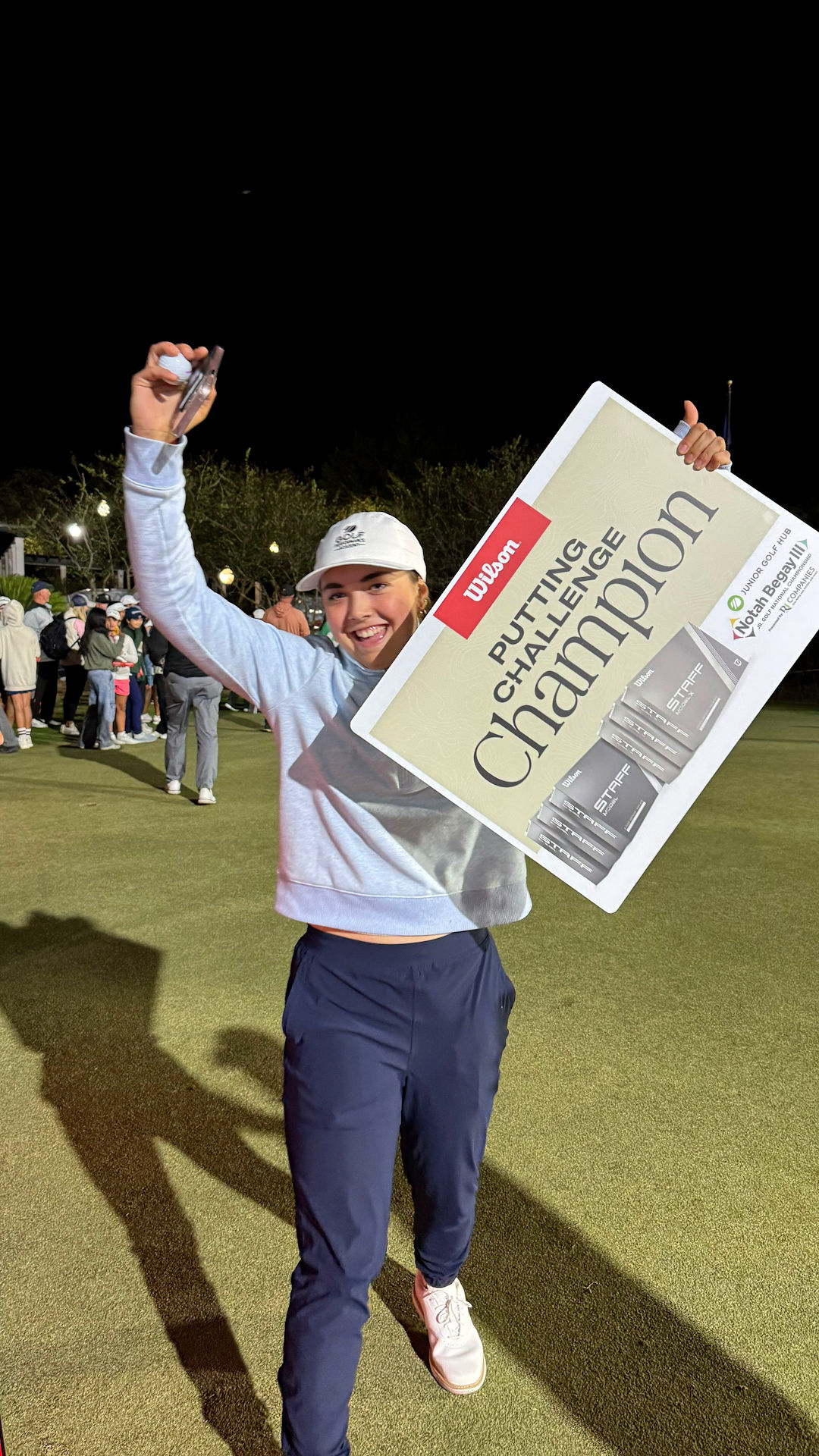 Soccer goalkeeper receiving instruction from coach